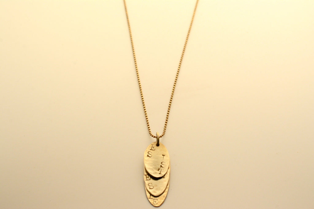 Gold pendant with engraving - It is what it is, says love