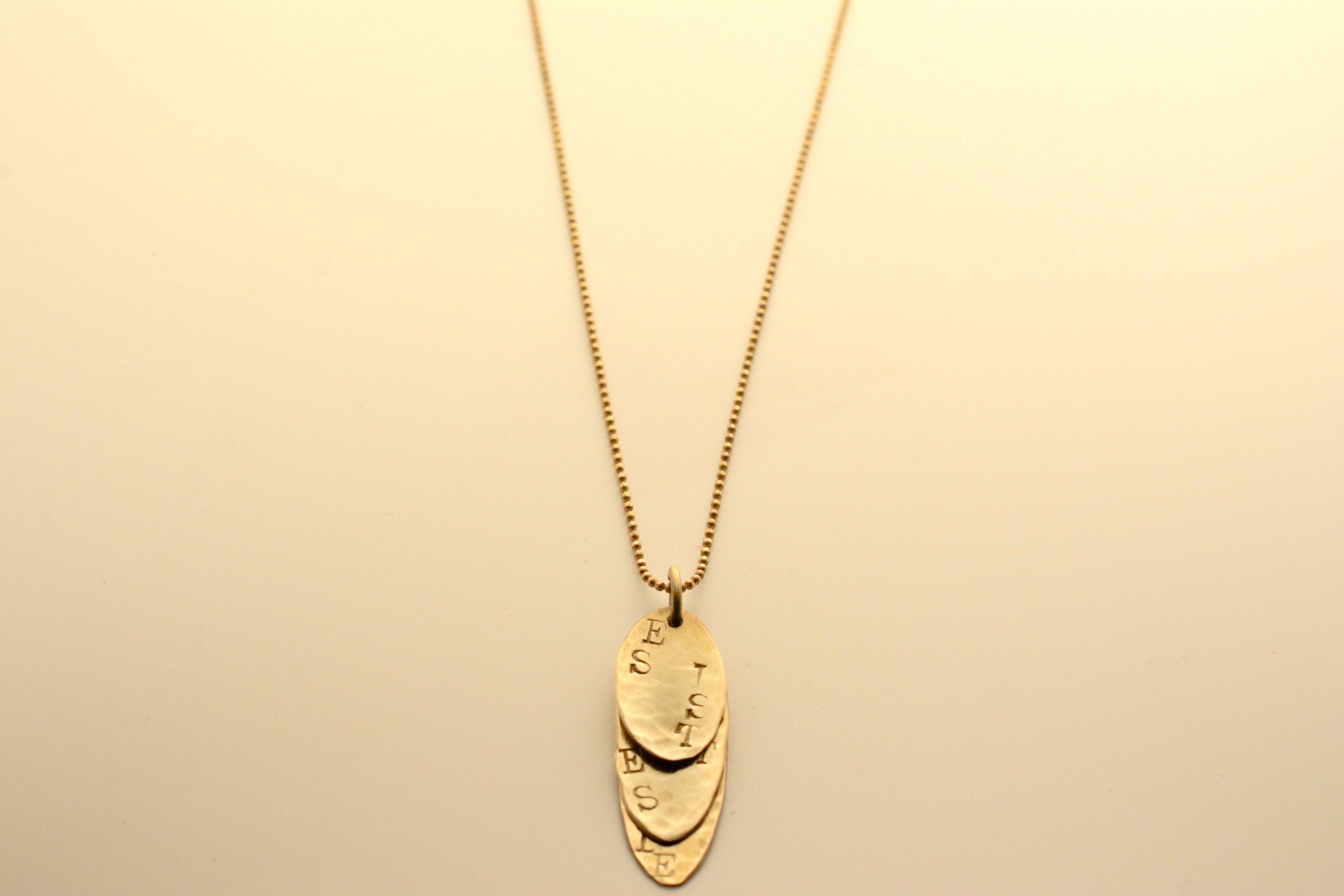 Gold pendant with engraving - It is what it is, says love