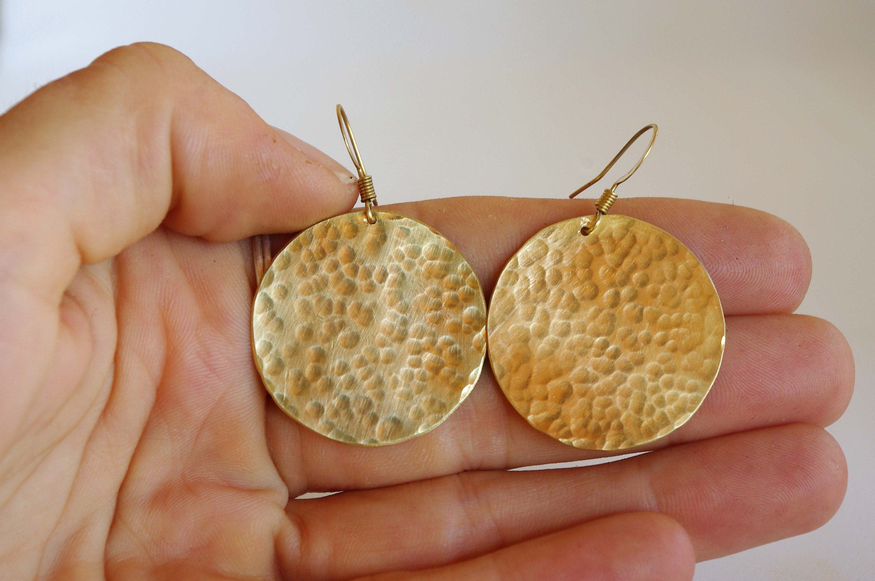 Round gold earrings