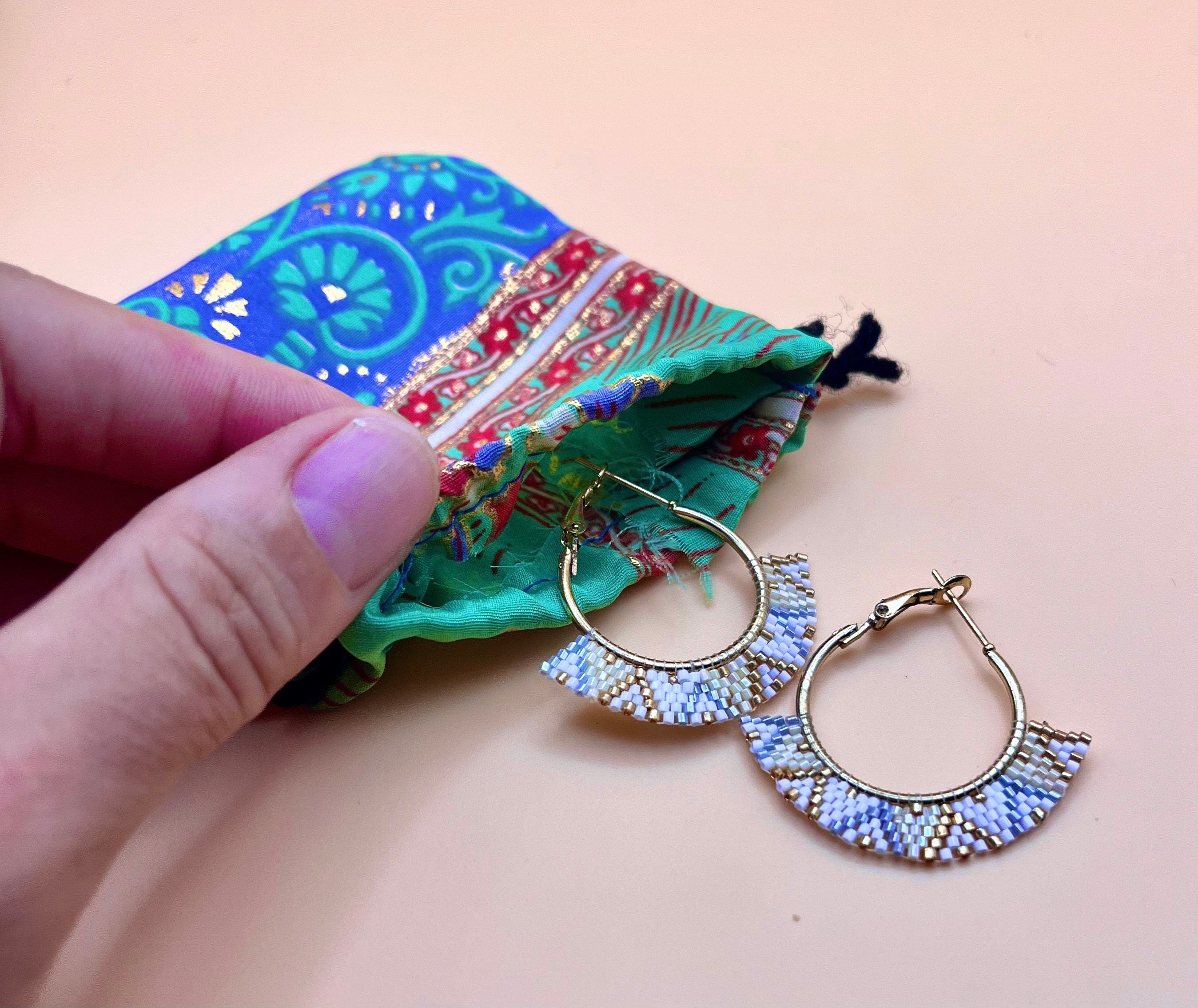 Gold hoops with glass beads