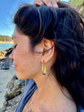 Elongated gold hoops