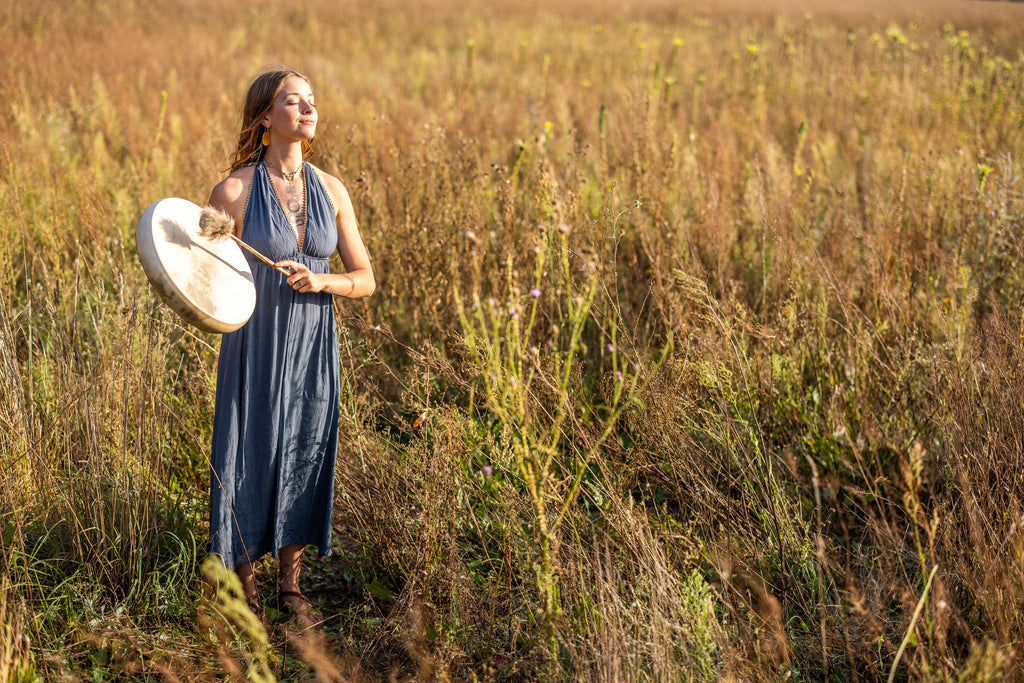 Festive boho dress with golden beads at the V-neck